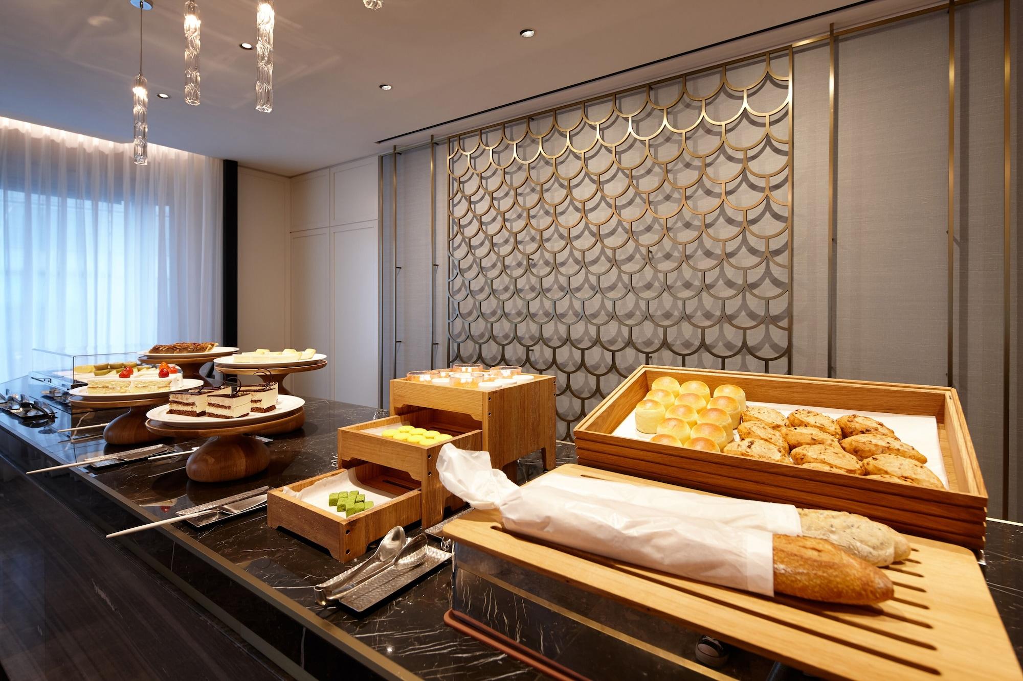 Lotte Hotel Seoul Executive Tower Seul Exterior foto A buffet at a hotel